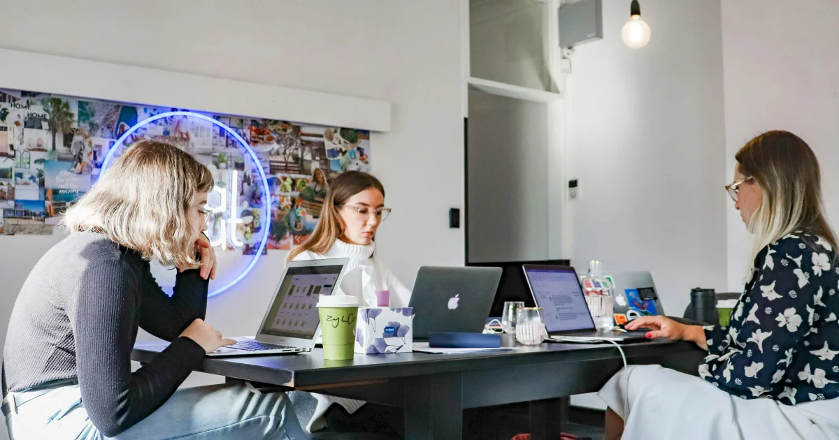 B2B growth agency team working together in a creative office